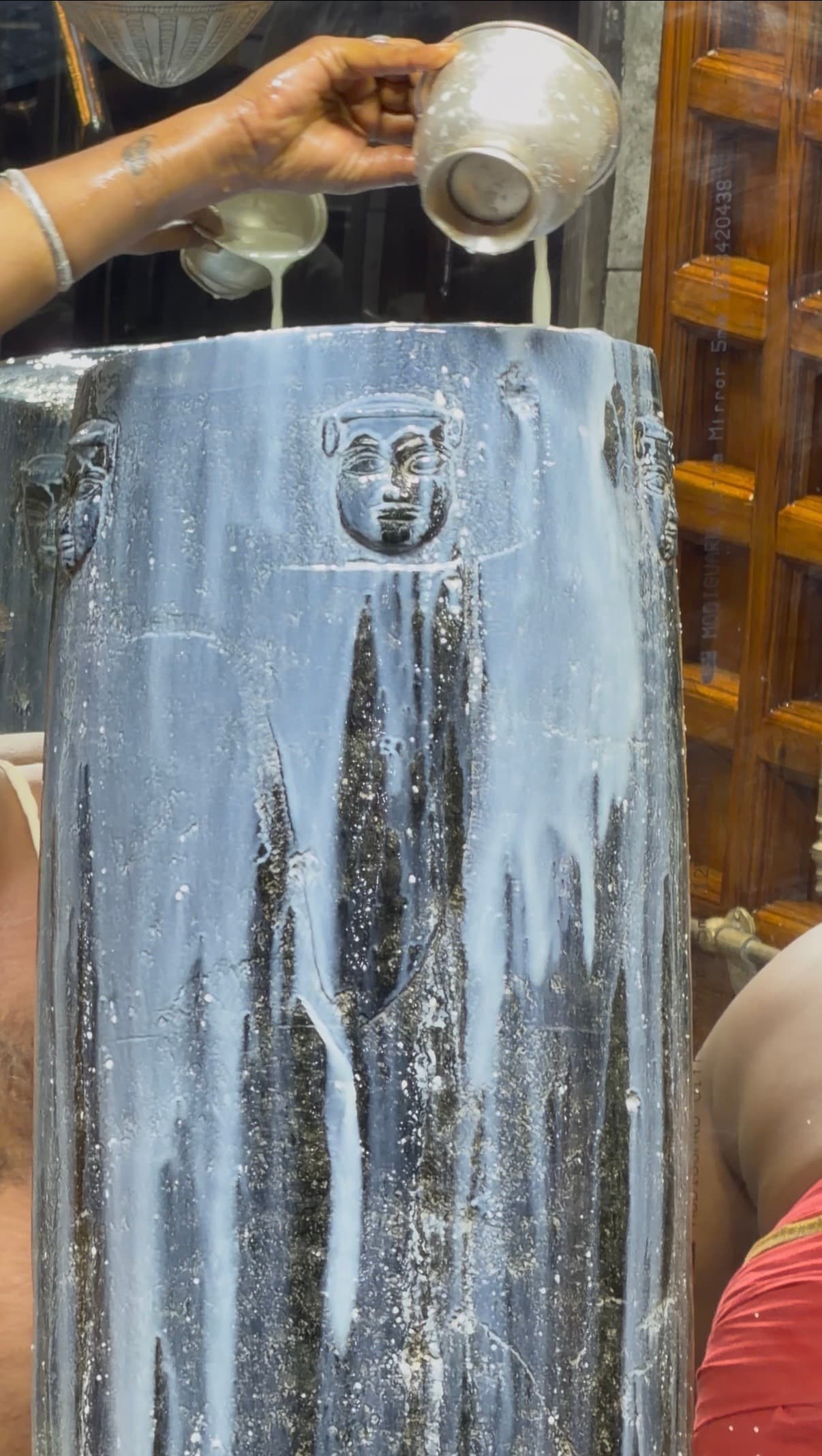 Milk Abhishekam being performed on Sri Maha Panchamukheswara Swamy — the sacred Panchamukha Linga