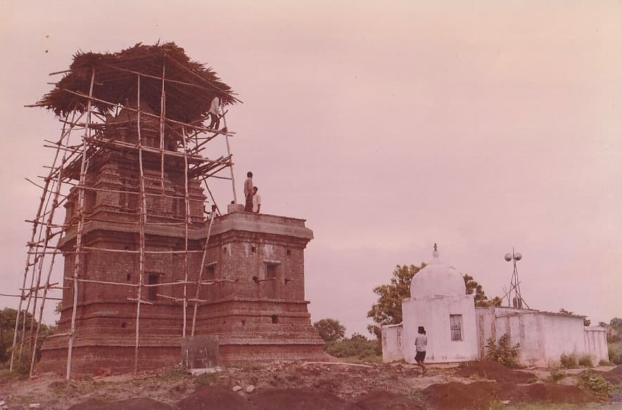 Original temple gopuram under construction — a glimpse into the early history of the Devasthanam